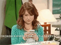 Giggly Ellie Kemper Texting GIF