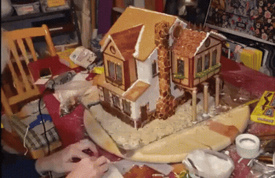 Gingerbread House Being Built GIF