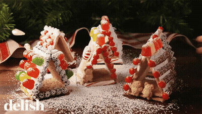 Gingerbread House Decorated With Candy Canes GIF