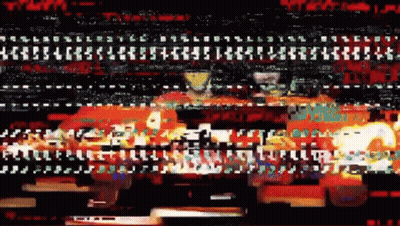 Gingerbread Man Covered In Confetti Saying Happy New Year GIF