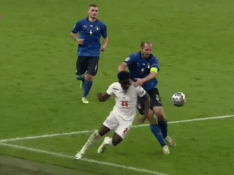 Giorgio Chiellini Grab The Tshirt Of Saka GIF