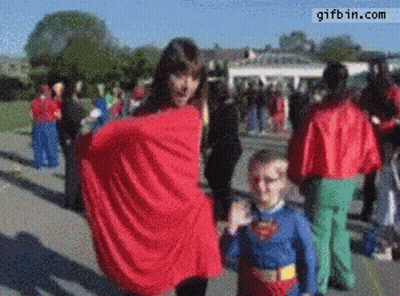 Girl And Boy In Superman Costumes GIF