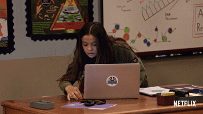 Girl At Desk With Laptop And Netflix Sticker GIF