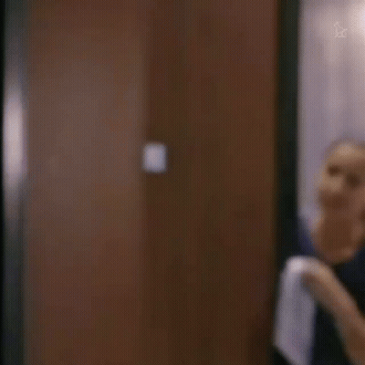 Girl At Door With Welcome Sign GIF