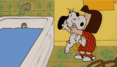 Girl Brushing Snoopy's Teeth In Bathroom GIF