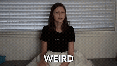 Girl By Window With Word Weird GIF