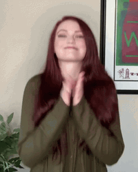 Girl Clapping And Jumping For Joy GIF