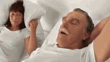 Girl Covering Snoring Man GIF