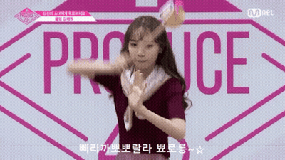 Girl Dancing In Front Of Produce GIF