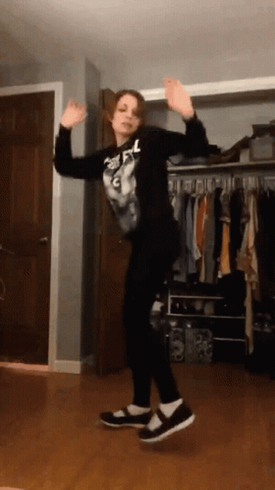 Girl Dancing In Room With Clothes GIF