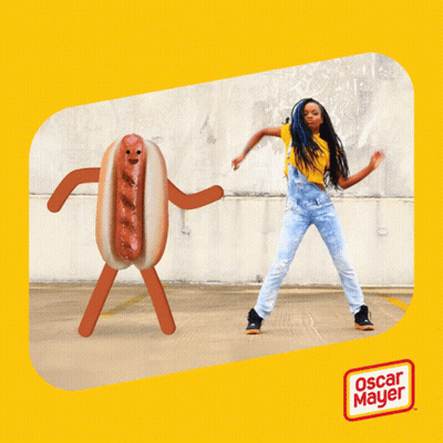 Girl Dancing Next To Oscar Mayer Hot Dog GIF