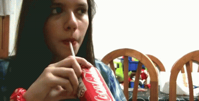 Girl Drinking Coca Cola Through Straw GIF