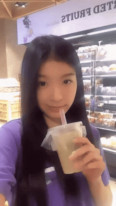 Girl Drinking From Cup With Straw LED Sign GIF