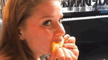 Girl Eating Juicy Orange GIF