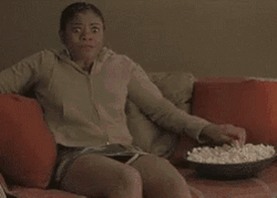 Girl Eating Popcorn While Watching GIF