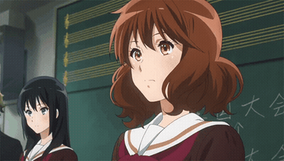 Girl Eyes Closed In Front Of Chinese Blackboard GIF