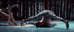 Girl Face On Floor Single Leg Deadlift Up GIF