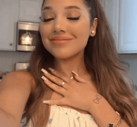 Girl Feeling Grateful And Flattered GIF
