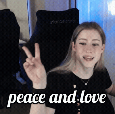 Girl Giving Peace Sign Saying Peace And Love GIF