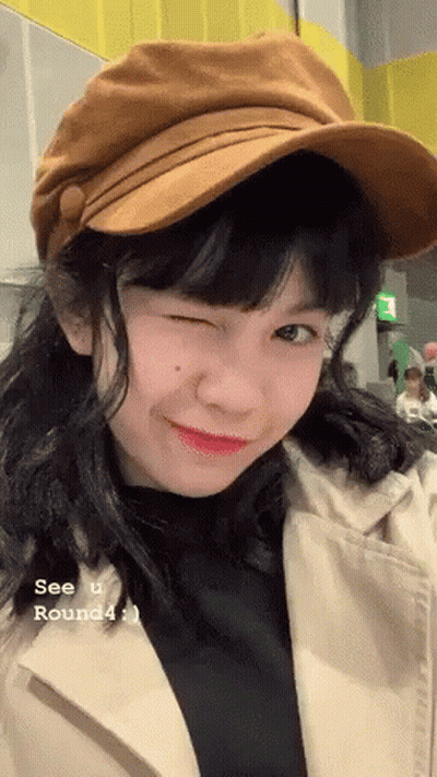 Girl Hat Trench Coat Winks See U Round4 GIF