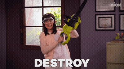 Girl Holding Chainsaw With Destroy On Wall GIF