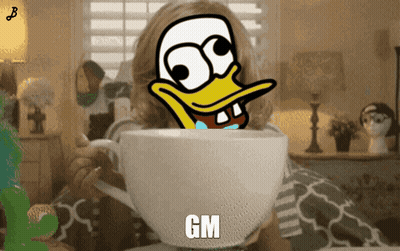 Girl Holding Cup With Duck Saying GM GIF