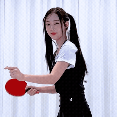 Girl Holding Red Ping Pong Paddle GIF