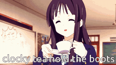 Girl Holding Tea Cup With Clocky Tea GIF