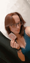 Girl Holding Uno Reverse Card GIF