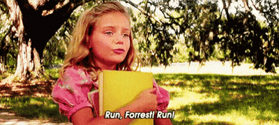 Girl Holding Yellow Book Saying Run GIF