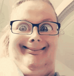 Girl In A Glasses Playing With Filters  GIF