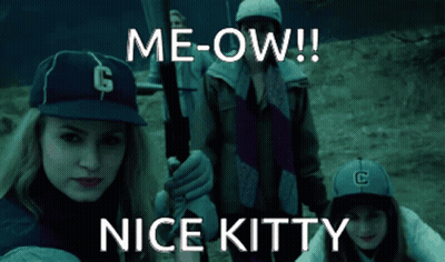 Girl In Baseball Cap Saying Me-Ow Nice Kitty GIF