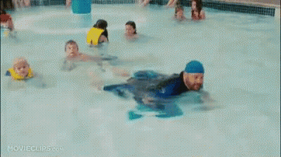 Girl In Bathing Suit Holding Towel GIF