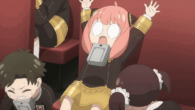 Girl In Black And Gold Dress Holding Box GIF