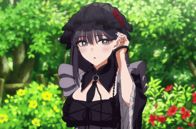 Girl In Black Dress And Hat Standing In Front Of Flowers GIF