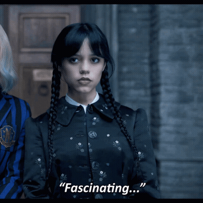 Girl In Black Dress Says Fascinating GIF
