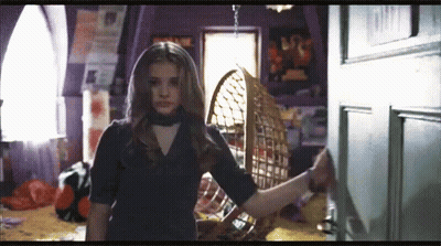 Girl In Black Dress Standing In Room GIF