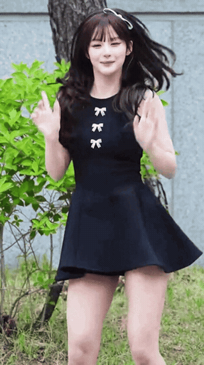 Girl In Black Dress With Three Bows GIF