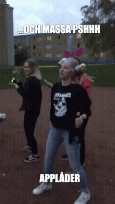 Girl In Black Shirt With Applader GIF