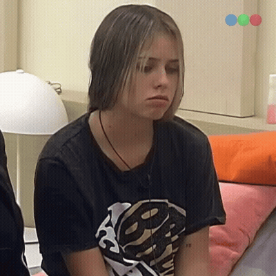 Girl In Black Skull T-Shirt On Bed GIF