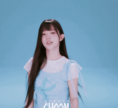 Girl in Blue Dress in Front of Studio Chaam Background