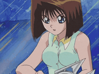 Girl In Blue Shirt Holding Triangle GIF