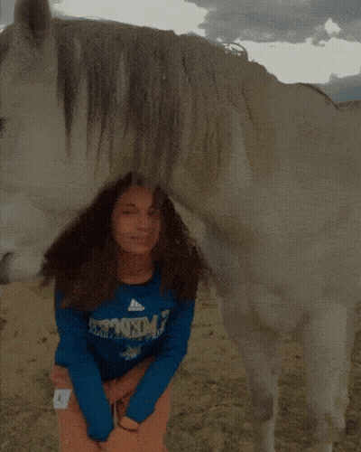 Girl In Blue Shirt Saying Freedom GIF