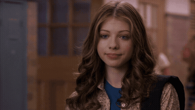 Girl In Blue Shirt With Backpack Letter M GIF