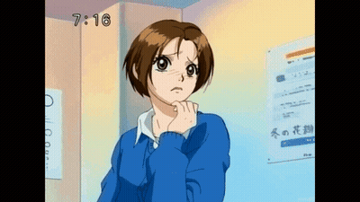 Girl In Blue Sweater Near O Sign GIF