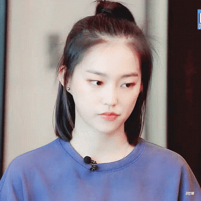 Girl In Blue Sweatshirt With Microphone GIF