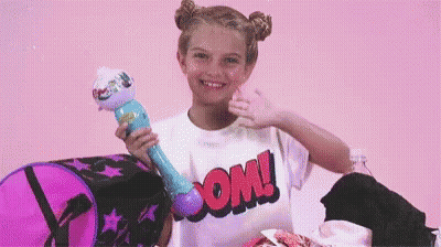 Girl In Boom Shirt Holding Microphone GIF