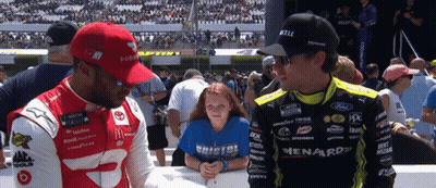 Girl In Bristol Shirt Next To Man In Ford Uniform GIF