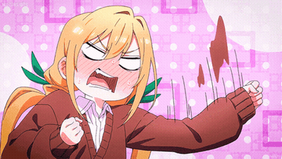 Girl In Brown Sweater Making Funny Face With Chocolate GIF