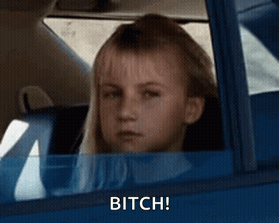 Girl In Car Looking Out Window Says Bitch! GIF